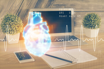 Desktop computer background and heart drawing. Double exposure. Medical study and healthcare concept.