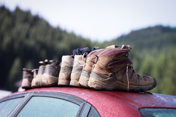 a hiking boots at the car