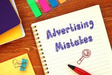 Financial concept about Advertising Mistakes with inscription on the sheet.