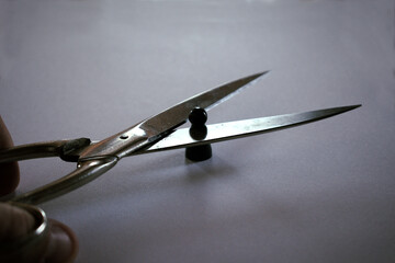 Heading black pawn with scissors