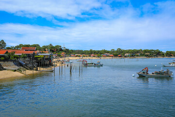 View of oyster-farming ports and villages with blue sky in Cap-Ferret point, Bordeaux, Gironde,...