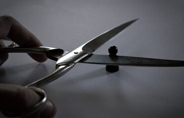 Heading black pawn with scissors