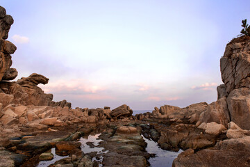 Beautiful rock and waves on the seashore along the coastline.