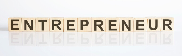 Text ENTREPRENEUR business concept with wooden blocks