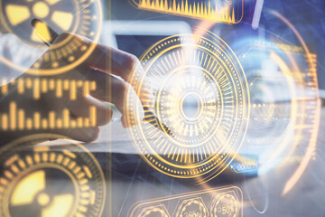 Tech theme hologram over woman's hands taking notes background. Concept of hightech. Double exposure