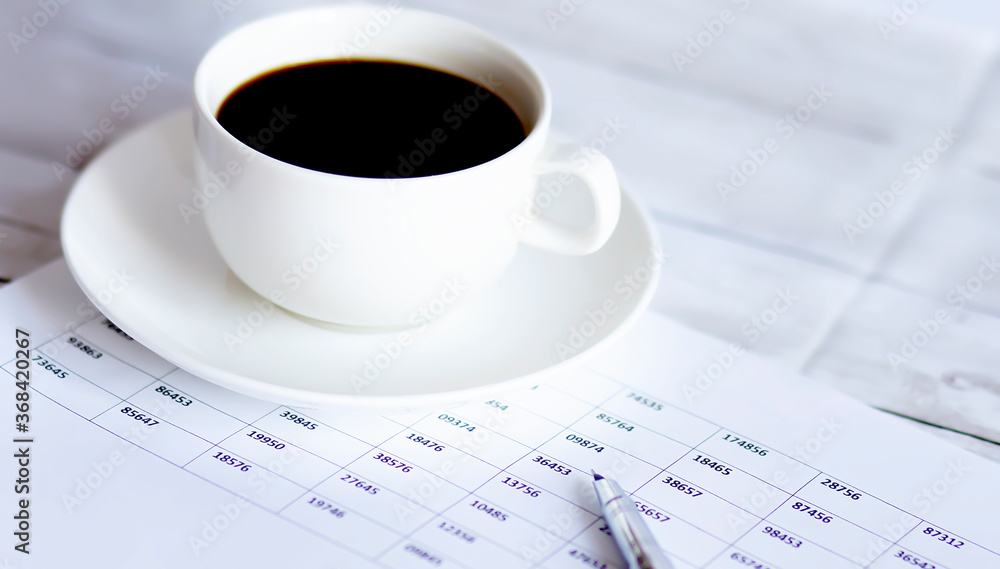 Poster top view of stuff office desktop and copy space. analyze data chart show on paper and coffee.