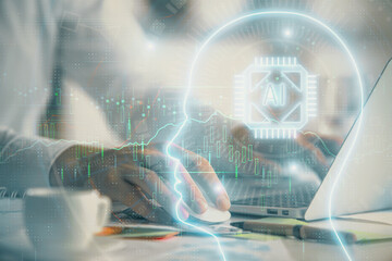 Man typing on keyboard background with brain hologram. Concept of big Data.