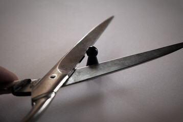 Heading black pawn with scissors