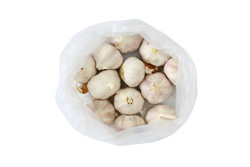 garlics in plastic bag on isolated white background 