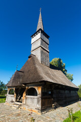Fototapeta na wymiar Traditional wooden church in Remetea Chioarului vilage, Maramures, Romania.