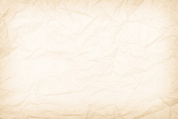 Brown recycled paper crumpled texture background. Cream Old vintage page or grunge vignette parchment old blank newspaper. Pattern empty rough cardboard creased grunge surface backdrop with space.
