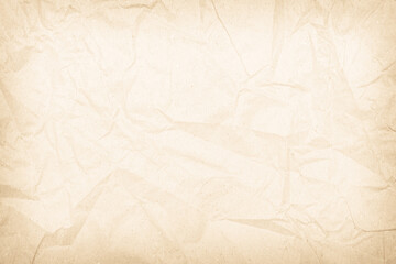 Brown recycled paper crumpled texture background. Cream Old vintage page or grunge vignette parchment old blank newspaper. Pattern empty rough cardboard creased grunge surface backdrop with space.