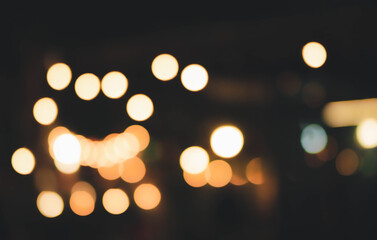 Blur the lights at the restaurant Blurred background with orange, red, light, blue, green, pink bokeh.