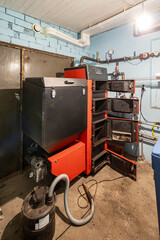 Heating system in a private house. Boiler room in cottage.