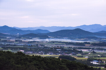 Fototapeta premium The beautiful misty landscape at the top of mountain.
