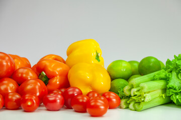 Composition with raw vegetables on white background.