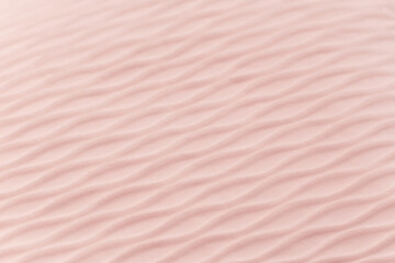 Fototapeta premium Soft blurred pale pink rib waves fabric texture background.