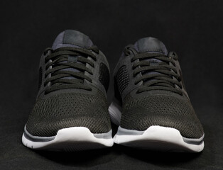 Pair of modern black running shoes