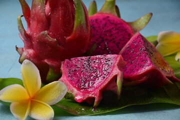 Dragon fruit (Pitaya, Pitahaya) Cut into half, one whole, two sliced pieces
pitahaya fruit. 
