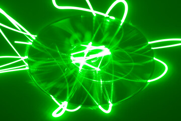 Compact disk under green laser beam