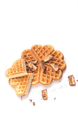 Freshly baked waffles with chocolate isolated on white background