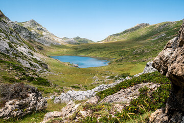 Beautiful lake surrounded by mountains in Somiedo National Park, Asturias.