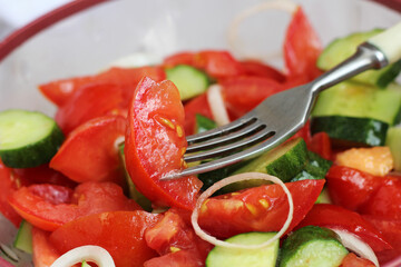 Vegetable salad with tomatoes and cucumbers
