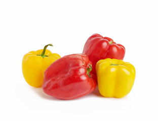 red and yellow sweet peppers isolated on white background