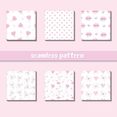 Seamless watercolor heart pattern on paper texture. Valentine's day background