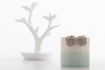 Close up of diamond earrings. space for your text.