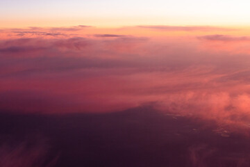Fototapeta premium Clouds scape at sunset from above