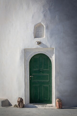 old style wooden doors and windows in Santorini