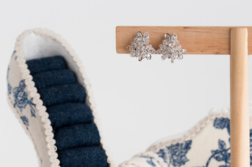 Close up of diamond earrings. space for your text.