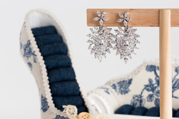 Close up of diamond earrings. space for your text.