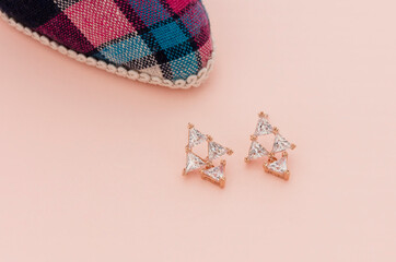 Close up of diamond earrings. space for your text.