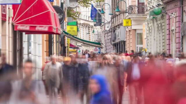 View on Ferhadija pedestrian street crowded with people timelapse. Famous place in downtown with many shops and reastaurants in Sarajevo