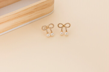 Close up of diamond earrings. space for your text.