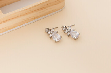 Close up of diamond earrings. space for your text.