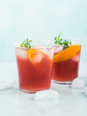 Fresh red coktail sangria in pitcher and glasses