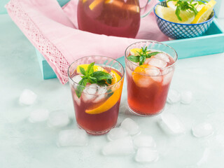Fresh red coktail sangria in pitcher and glasses