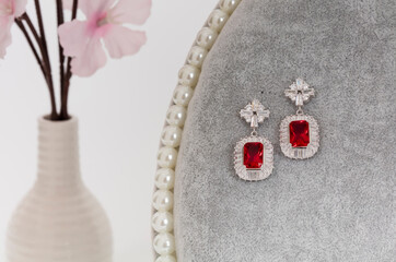 Close up of diamond earrings. space for your text.