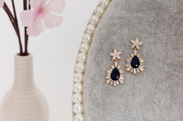 Close up of diamond earrings. space for your text.