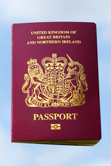 The new British Passport of the United Kingdom of Great Britain and Northern Ireland for when Britain leaves the EU in 2020 - isolated on a sky background.