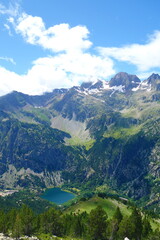 Fototapeta na wymiar View from a hiking trail GR11 in Pyrenees on Banos de Panticos village, Huesca, Spain