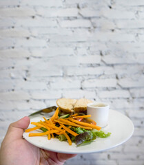 Sandwich on White brick wall background. Space for your text.