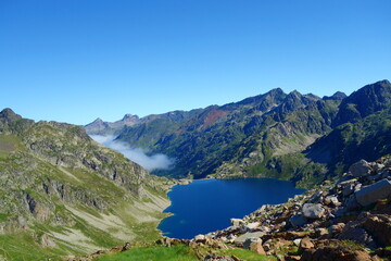 Fototapeta na wymiar Lake Artouste is a natural lake, of glacial origin, from the Ossau valley in the Pyrénées-Atlantiques, France