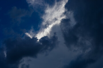 Light in the Dark and Dramatic Storm Clouds