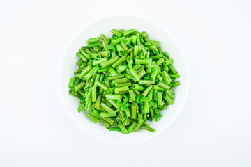 Stir-fried convolvulus with green pepper on a dish of home cooking on white background