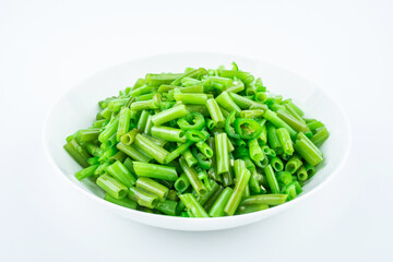 Stir-fried convolvulus with green pepper on a dish of home cooking on white background