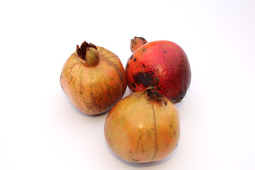 fresh healthy sweet pomegranate isolated on white background